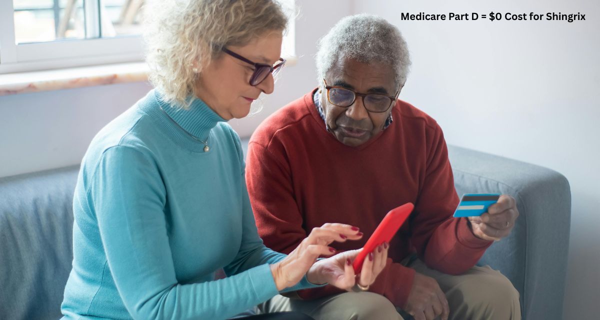 A senior couple reviewing their Medicare insurance details online, looking pleased about the coverage.
